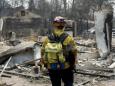 California wildfire: Firefighters gain ground on devastating inferno as victims' families reel from loss
