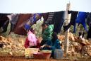 Tens of thousands flee clashes between Syria army, IS