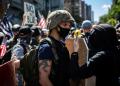 Police arrest 14 after Portland rocked by clashes between demonstrators