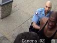 Surveillance video of the moments leading up to George Floyd being pinned under a policeman's knee shows that he didn't resist arrest