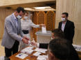 Syrians vote for new parliament amid measures against virus