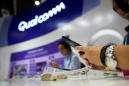 Qualcomm hangs on to most Apple gains after earnings report