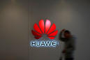 Huawei founder's daughter arrested on U.S. request, clouding China trade truce
