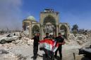 Islamic State under pressure in Iraqi and Syrian strongholds