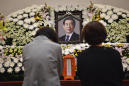 Seoul mayor's death prompts sympathy, questions of his acts
