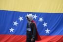 Venezuela opposition holds vote to rattle Maduro