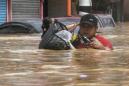 Major floods in Manila as typhoon batters Philippines
