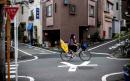 Japan cyclist becomes first to face dangerous driving charges after law change to include bikes