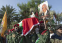 Palestinians hold funeral for veteran negotiator Erekat