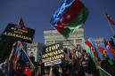 Azerbaijan says Armenia targets cities outside conflict zone
