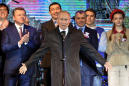 Putin flies into Crimea for annexation party, launches power stations