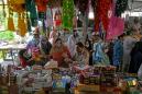 Pakistanis crowd markets as virus lockdown eased