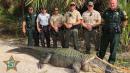 Officials Pose Alongside Enormous 13-Foot Alligator Captured in Florida