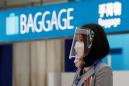 Experts call for Japan to keep current framework of virus containment