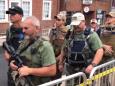 Militia force armed with assault rifles marches through US town ahead of white nationalist rally