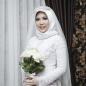 Woman wears wedding gown after fiance dies in Lion Air crash