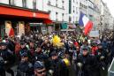 French police break up yellow vest protest with tear gas