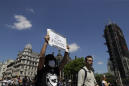 World alarmed by violence in US; thousands march in London