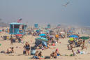 California heat wave draws large crowds to beaches despite stay-at-home order