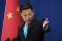 China's diplomats show teeth in defending virus response