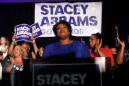 'Overwhelm the system' to thwart voter suppression, Stacey Abrams counsels blacks