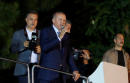 Turkey's Erdogan claims election victory, opposition wary