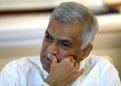 Sri Lanka's ousted PM says U.S., Japan freeze aid over political crisis