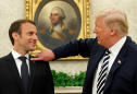 President Trump Brushes 'Dandruff' Off French President Macron’s Suit as the Two Leaders Tussle Over Iran