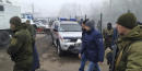 Ukraine, eastern rebels swap prisoners in move to end war