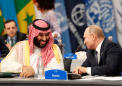 Putin and Saudi Crown Prince Mohammed bin Salman exchange friendly handshake at G-20
