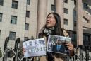 Chasing shadows in China: Detained lawyer's wife battles on