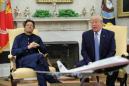 Pakistan PM Khan returns home exulting after Washington visit