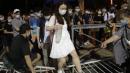 Hong Kong: Tens of thousands defy ban to attend Tiananmen vigil