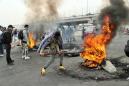 Dozens wounded as Iraqi protesters up pressure on government