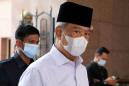 Malaysian PM quarantines after minister tests positive for COVID-19