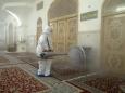 The Middle East is coping with the coronavirus by disinfecting mosques and canceling Muslim prayers