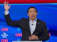 Andrew Yang eschewed the usual American flag lapel pin for one that said 'math' instead at the debate