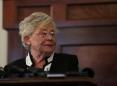 Alabama governor signs strict abortion ban into law