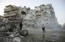 Pause in Aleppo bombing holds into second day