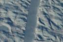 NASA photos capture a strange new crack in a massive Greenland glacier and we're all probably doomed