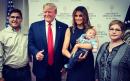 Melania Trump holds two-month-old baby orphaned in El Paso