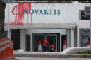 Greek anarchist group smashes windows at Novartis office in Athens