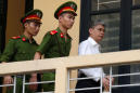 Vietnam court sentences to death PetroVietnam ex-chairman in mass trial