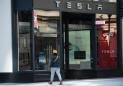 Tesla changes course, will keep more showrooms open