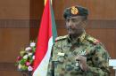 Sudan swears in ruling council and prime minister