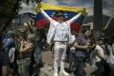 The Latest: Venezuelan military attache breaks with Maduro