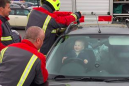 Toddler accidentally locks himself in car, has a great time getting rescued