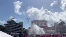 Trump rally organisers fire water at crowd as supporters pass out in Texas heat