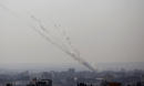 The Latest: 8 die as Israeli planes hit Gaza