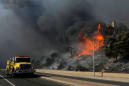 Wildfire burns homes, winery in L.A.'s posh Bel-Air neighborhood